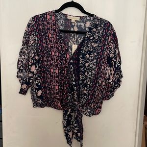 Small Lovestitch blouse. Blue, white, pink and hot pink floral.